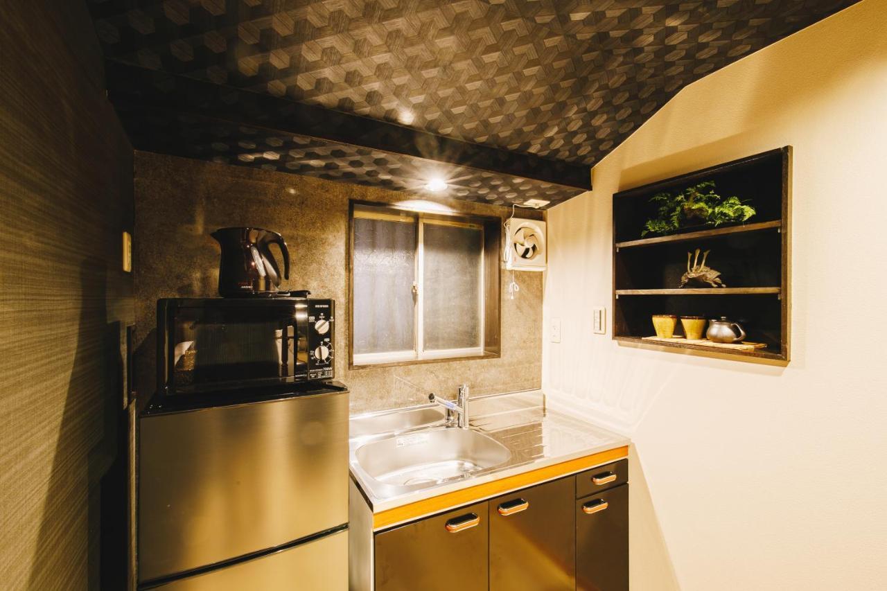 Bijou Suites Fuku Osaka Bagian luar foto